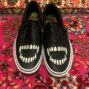 Vans Black and White Slip-On Shoes